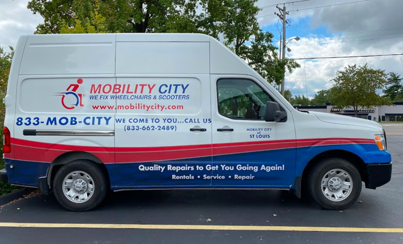 Mobility City work van in a parking space
