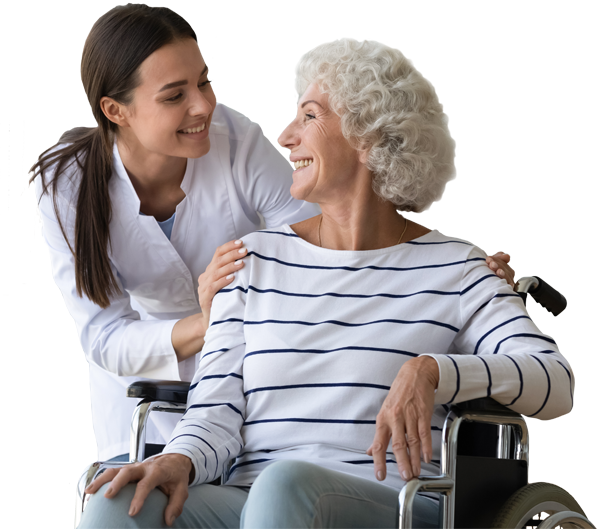A nurse smiling with patient in wheelchair
