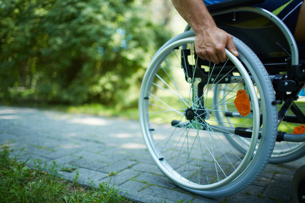 A person using a manual wheelchair